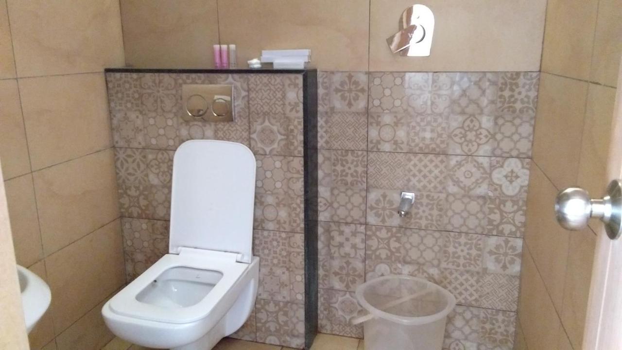 Mango Hill Central Уті Екстер'єр фото